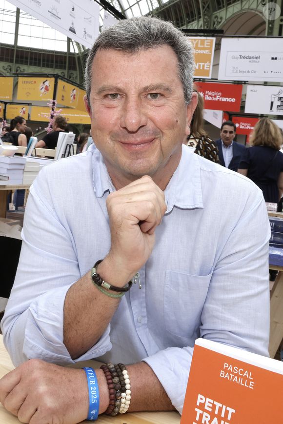 Cette discipline, pratiquée par 10 millions de Français, l'a certainement aidé à garder le moral et à mieux supporter les soins.

Pascal Bataille - Festival du Livre de Paris au Grand Palais à Paris.
© Cédric Perrin / Bestimage
