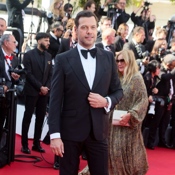 Laurent Lafitte - Montée des marches pour la cérémonie de clôture du 77ème Festival International du Film de Cannes au Palais des Festivals à Cannes. Le 25 mai 2024
© Christophe Clovis / Bestimage