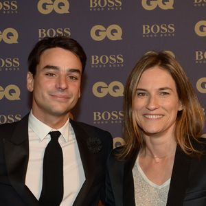 "Je n’ai pas vraiment de week-ends, mais je profite des vacances scolaires, durant lesquelles on part tous les quatre pour se retrouver."
Archives - Julian Bugier et sa femme Claire Fournier lors de la soirée "L'homme de l'année GQ 2014" au Musée d'Orsay, à Paris le 19 novembre 2014. RACHID BELLAK / BESTIMAGE