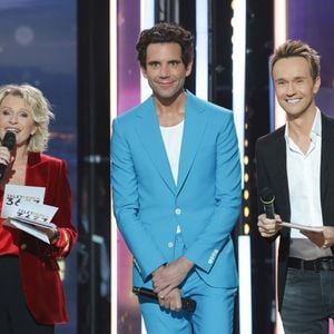 Sophie Davant, Mika et Cyril Féraud - Les célébrités se mobilisent pour la 38ème édition du Téléthon dans les studios de France 2 à Paris, le 29 novembre 2024. 
© Coadic Guirec / Bestimage