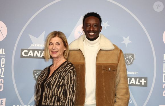 Michèle Laroque et Ahmed Sylla - Tapis rouge lors du 29ème Festival International du Film de Comédie de l'Alpe d'Huez le 20 Janvier 2026. © Dominique Jacovides/Bestimage