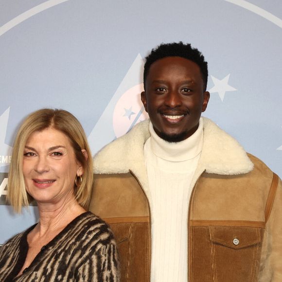 Michèle Laroque et Ahmed Sylla - Tapis rouge lors du 29ème Festival International du Film de Comédie de l'Alpe d'Huez le 20 Janvier 2026. © Dominique Jacovides/Bestimage