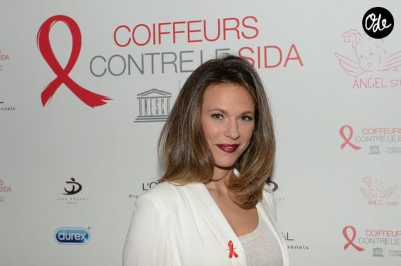 La chanteuse Lorie lors de l’opération "Coiffeurs Contre le Sida" édition 2014 à l’Académie L’Oréal Produits Professionnels à Paris, le 1er décembre 2014.

© RACHID BELLAK / BESTIMAGE