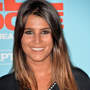 Cette journée festive était d'autant plus spéciale qu'elle coïncidait avec le dixième anniversaire de leur fils aîné, Maël.

Karine Ferri - Avant-première du film "Elle l'adore" au cinéma UGC Normandie à Paris, le 15 septembre 2014.
VEEREN / BESTIMAGE