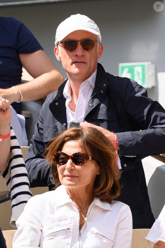 Gilles Bouleau et son épouse Elisabeth Tran-Bouleau dans les tribunes lors des Internationaux de France de tennis à Roland Garros le 28 mai 2022 à Paris, France. Photo de Laurent Zabulon/ABACAPRESS.COM