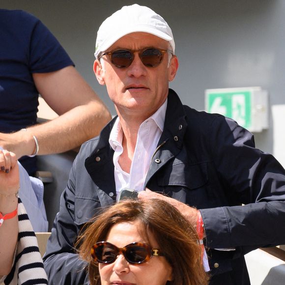 Gilles Bouleau et son épouse Elisabeth Tran-Bouleau dans les tribunes lors des Internationaux de France de tennis à Roland Garros le 28 mai 2022 à Paris, France. Photo de Laurent Zabulon/ABACAPRESS.COM