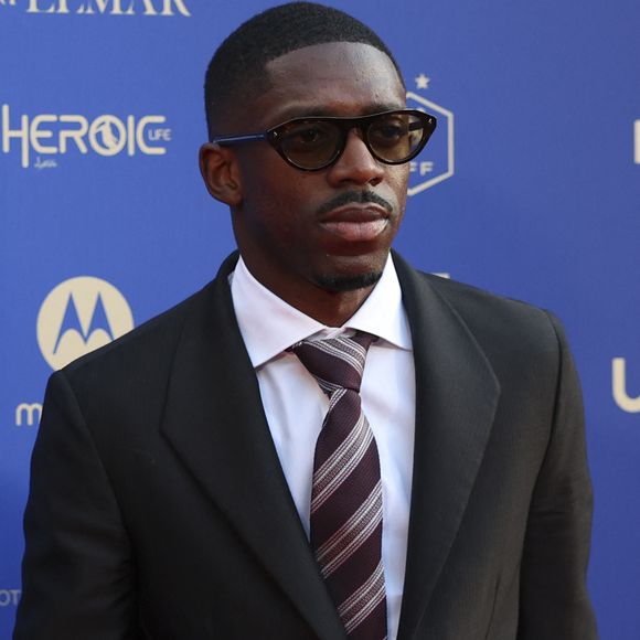 En marge de ces grands rendez-vous sportifs, le joueur diversifie ses activités en devenant ambassadeur d'une marque de luxe.

Ousmane Dembélé - Photocall de la 34ème édition des Trophées UNFP du Football au Palais Brongniart à Paris le 11 mai 2026. © Michael Baucher/PsnewZ/Bestimage