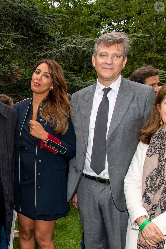 Exclusif - Arnaud Montebourg et Amina Walter en backstage lors de l'évènement "Le Concert de Paris" depuis le Champ-de-Mars à l'occasion de la Fête Nationale du 14 Juillet 2021.
© Perusseau-Veeren/Bestimage