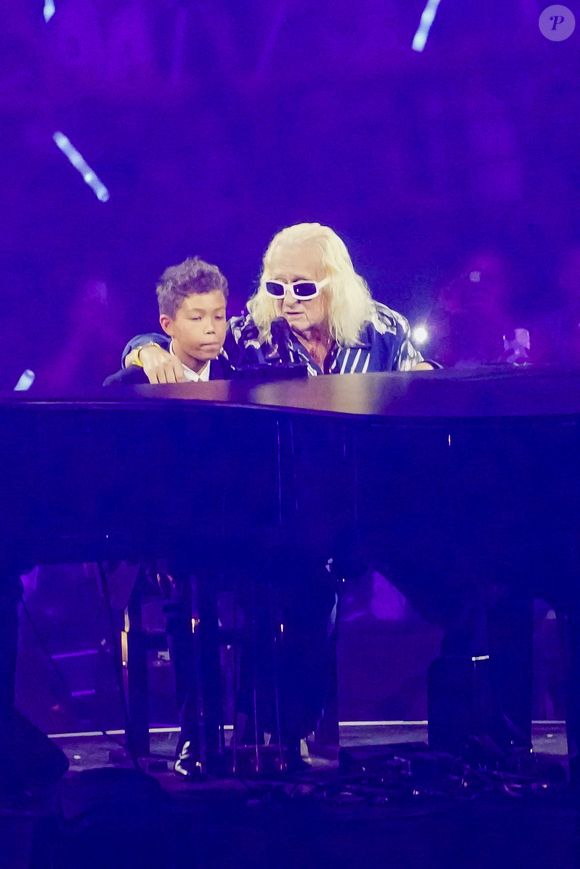 Exclusif - Michel Polnareff fête son anniversaire (79 ans) avec son fils Louka sur la scène de l'Accor Arena (Bercy) à Paris le 3 juillet 2023. POUR INFOS VOIR VENDEUR