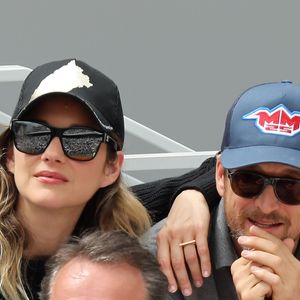 Marion Cotillard et Guillaume Canet - People dans les tribunes lors de la finale messieurs des internationaux de France de tennis de Roland Garros 2019 à Paris le 9 juin 2019. © Jacovides-Moreau/Bestimage