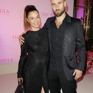 Denitsa Ikonomova (enceinte) et son compagnon François Alu - Photocall du 5ème gala de charité de l'association "Les Bonnes Fées" à l'occasion de la campagne mondiale "Octobre Rose" à l'hôtel Peninsula, Paris le 3 octobre 2024. © Coadic Guirec/Bestimage