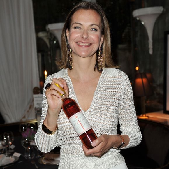 Son installation, non préméditée, devient un projet de vie exigeant, entre restauration et enracinement. 

Carole bouquet - présentation du vin "sangue d'oro" de carole bouquet lors d’un événement jaeger-lecoultre au restaurant filippo la mantia de l’hôtel majestic à rome. le 23 avril 2012. SGP / BESTIMAGE