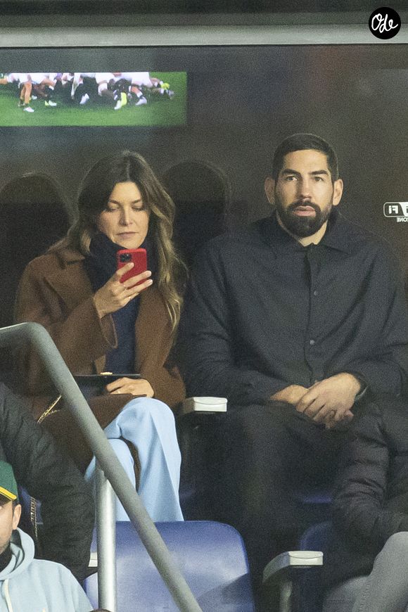 Nikola Karabatic et sa femme Géraldine Pillet dans les tribunes du Stade de France à Saint-Denis, le 21 octobre 2023. 

© Cyril Moreau/Bestimage