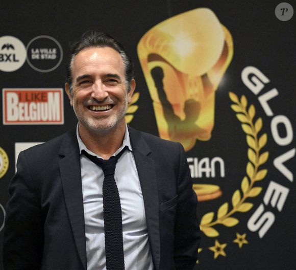 Début septembre, il avait participé aux Gants d’Or en Belgique, confirmant sa passion pour la boxe en plus du cinéma.

Jean Dujardin, parrain d’honneur à la treizième édition des Gants d’Or ( Belgian Golden Gloves ), qui célèbre les figures marquantes de la boxe belge, toutes générations confondues, à Bruxelles, Belgique, le 5 septembre 2025. © Didier Lebrun/Photonews/Bestimage