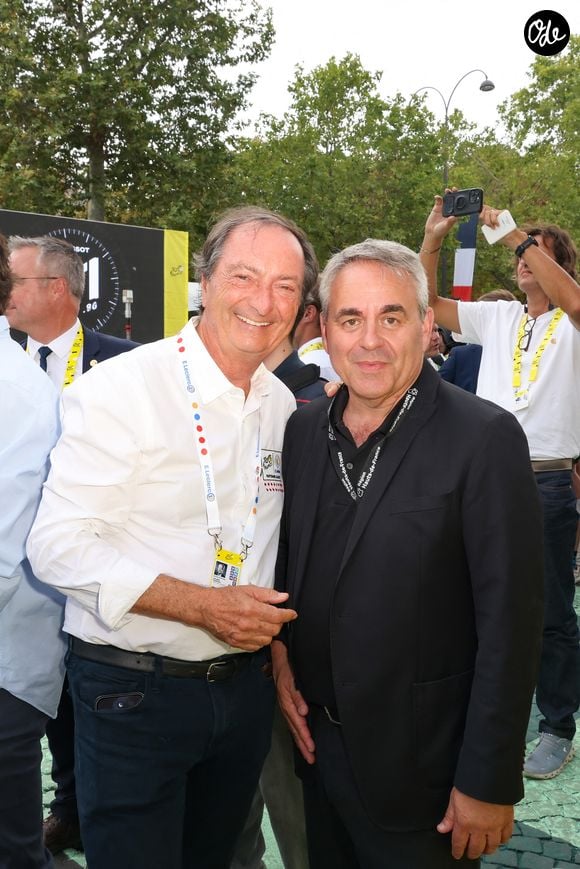 Michel-Edouard Leclerc, Xavier Bertrand  - 21ème et dernière étape de la 113ème édition du Tour de France entre Paris - Champs Elysées et Paris - Champs Elysées le 26 juillet 2026. © Jack Tribeca / Bestimage