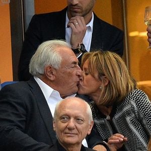 Dominique Strauss-Kahn et Myriam L'Aouffir assistent à la finale de la Coupe de France de football entre le Paris Saint Germain (PSG) et Auxerre (AJA) le 30 mai 2015 au Stade de France à Saint-Denis, au nord de Paris.