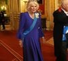 Elle portait une longue robe bleue Fiona Clare et un chapeau Philip Treacy.

Donald J. Trump (président des Etats-Unis) et la Première dame Melania Trump, le roi Charles III d'Angleterre et Camilla Parker Bowles, reine consort d'Angleterre, le prince William, prince de Galles, et Catherine (Kate) Middleton, princesse de Galles, lors du banquet d'Etat au chateau de Windsor en l'honneur de la visite officielle de président Donald Trump et de la Première dame Melania au Royaume-Uni. © PA Photo/ Bestimage