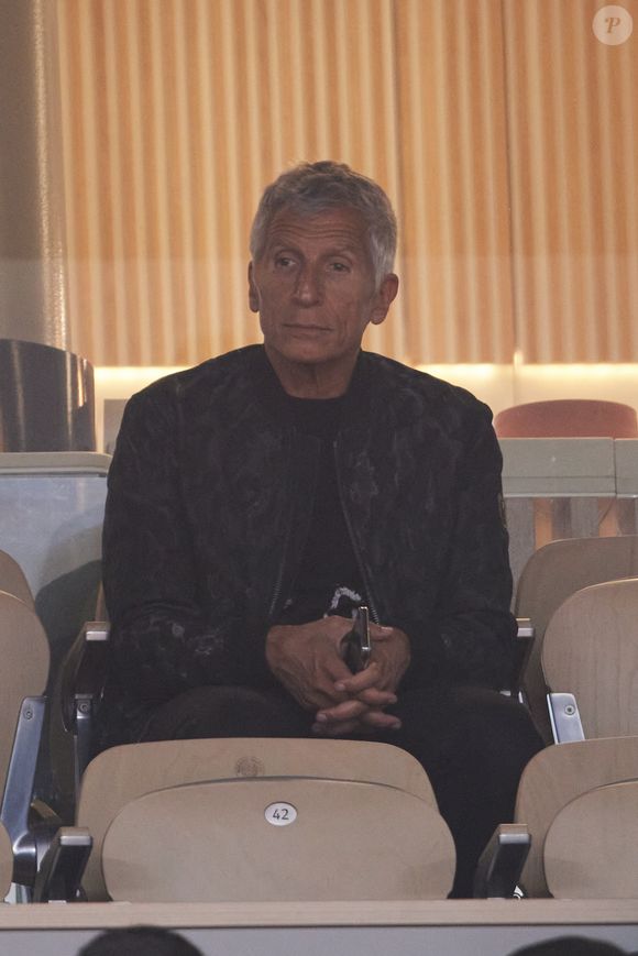 Nagui - Célébrités dans les tribunes des Internationaux de France de tennis de Roland Garros 2024 à Paris, le 29 mai 2024. 
© Moreau / Jacovides / Bestimage