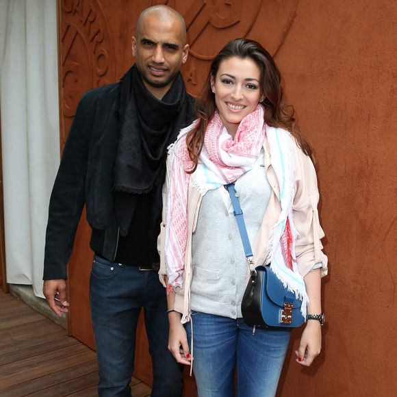 Aurélien Capoue et sa femme Rachel Legrain-Trapani - People au village des Internationaux de France de tennis de Roland Garros à Paris, le 28 mai  2014.