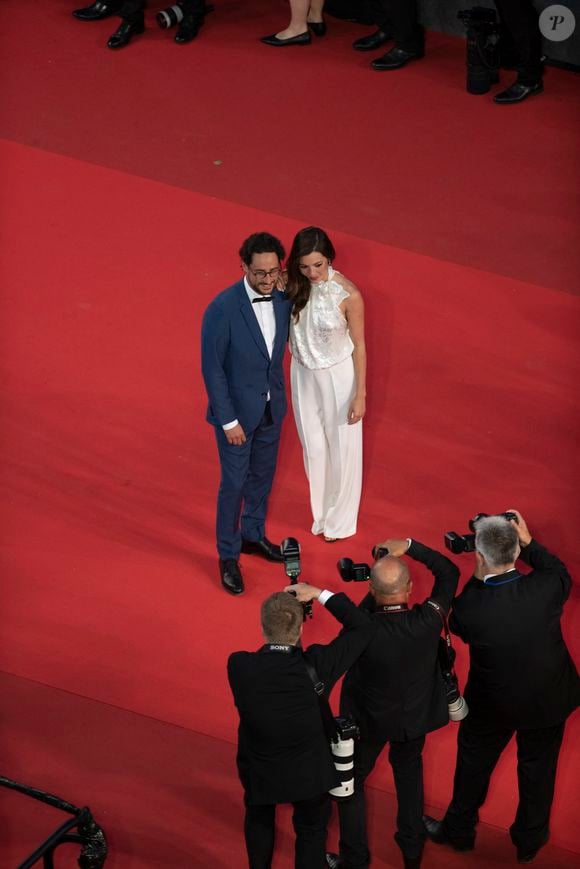 Thomas Hollande, sa femme Emilie Broussouloux - Montée des marches du film "R.M.N." lors du 75ème Festival International du Film de Cannes, le 21 mai 2022.
© Pool/ Bestimage