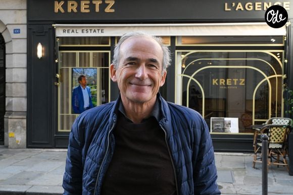 Pour lui, le développement de l’agence doit rester associé à une véritable dimension humaine.

Olivier Kretz - La famille Kretz, rendue célèbre par la série L’Agence diffusée sur Netflix, inaugure sa première agence immobilière physique à Paris, dotée de six pièces au 100 rue du Bac, dans le 7ème arrondissement de Paris, France, le 2 février 2026. © Lionel Urman/Bestimage