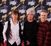 Indochine a ouvert la 28e cérémonie des NRJ Music Awards avec les titres "Victoria" et "L’Aventurier", avant de recevoir un prix d’honneur.

Marc Eliard, Olivier Gérard, Nicolas Sirkis et Dimitri Bodianski, du groupe « Indochine », assistent à la 26e cérémonie des NRJ Music Awards au Palais des Festivals, le 1er novembre 2024 à Cannes, en France. Photo : Anne Barson/ABACAPRESS.COM