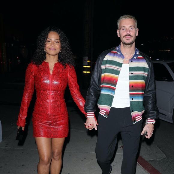BGUK_2807586 - Los Angeles, CA  - Christina Milian arrived to dinner in a red snake skin print  dress with her husband Matt Pokora  at Catch Steak LA in West Hollywood.



Pictured: Christina Milian