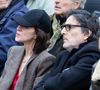 La compagne d'Yvan Attal y présentera pour la première fois des clichés personnels de la Maison Gainsbourg avant son ouverture en 2023.

Yvan Attal et Charlotte Gainsbourg - Inauguration de la passerelle Jane Birkin devant les 41-43 quai de Valmy à Paris le 13 décembre 2025.
© Cyril Moreau / Bestimage