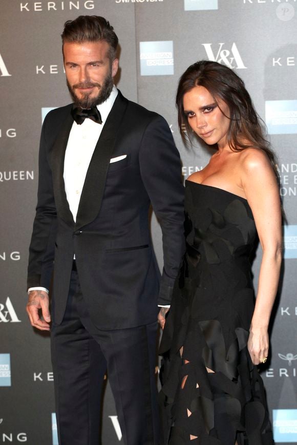 David Beckham et sa femme Victoria Beckham - Photocall du gala "Alexander McQueen : Savage Beauty" au Victoria and Albert Museum à Londres, le 12 mars 2015. Photo par Action Press / Bestimage
