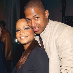 Christina Milian et Nick Cannon assistent à la première mondiale de ïRAY' aux Arclight Cinemas de Los Angeles le 19 octobre 2004. Photo par Lionel Hahn/Abaca.