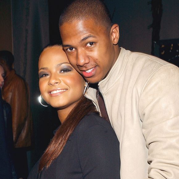 Christina Milian et Nick Cannon assistent à la première mondiale de ïRAY' aux Arclight Cinemas de Los Angeles le 19 octobre 2004. Photo par Lionel Hahn/Abaca.