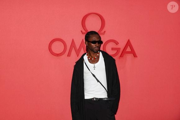 C'est mardi 13 mai dernier, via une vidéo diffusée lors de la cérémonie, qu'il s'était adressé à son public.

Werenoi au photocall  de la soirée d’ouverture  de la « Maison Omega » à l'hôtel de Poulpry, Maison des Polytechniciens pour les JO 2024 (Jeux Olympiques 2024)  à Paris, France, le 27 juillet 2024. © Olivier Borde - Jack Tribeca /Bestimage