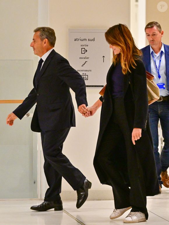 Nicolas Sarkozy et sa femme Carla Bruni au Tribunal judiciaire (Batignolles, 32ème chambre correctionnelle) pour l'annonce de la décision dans le cadre du procès Lybien le 25 septembre 2025.
Nicolas Sarkozy est déclaré coupable d'association de malfaiteurs mais relaxé des autres chefs d'accusation.

© Christian Liewig / Bestimage