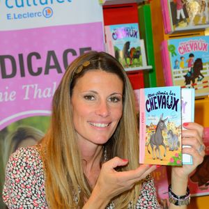 Miss France 1998 Sophie Thalmann signe des exemplaires de son livre sur les chevaux au centre commercial Leclerc de Chambly, France, le 5 avril 2014. Photo by Nicolas Briquet/ABACAPRESS.COM