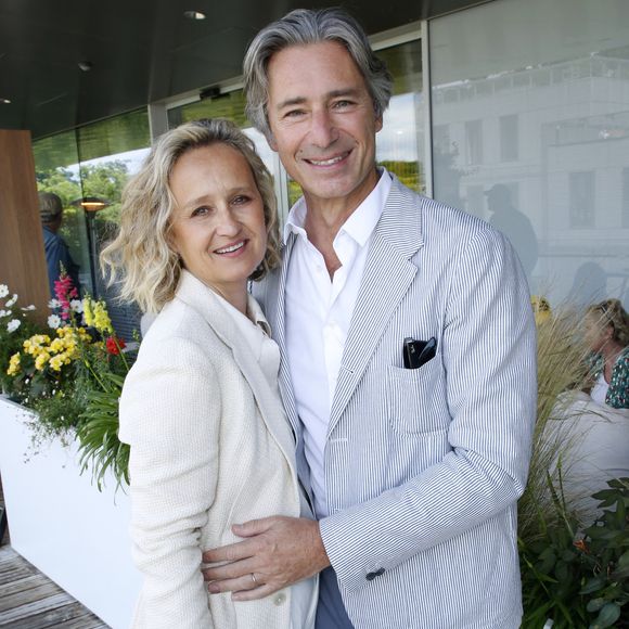 Exclusif - Caroline Roux et son mari Laurent Solly - Déjeuner dans la loge de France Télévisions lors de la Finale Hommes des Internationaux de France de Tennis de Roland Garros 2024 - Jour 15 à Paris. Le 9 Juin 2024.
© Bertrand Rindoff / Bestimage

|