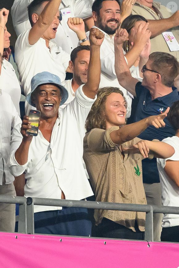 Yannick Noah et son fils Joalukas Noah assistent au match de la Coupe du monde de rugby France 2023 entre la France et la Nouvelle-Zélande au Stade de France le 08 septembre 2023 à Saint-Denis, en banlieue parisienne, France. Photo by Laurent Zabulon/ABACAPRESS.COM