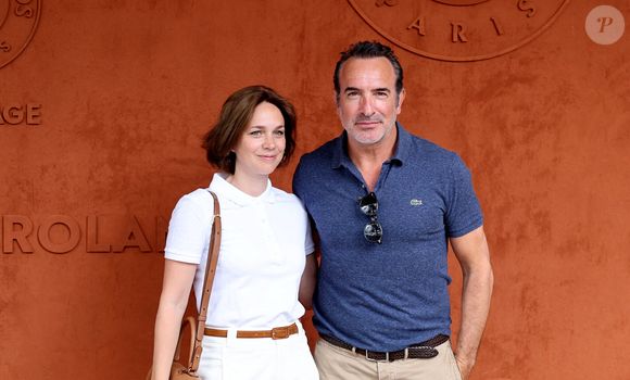 Jean Dujardin et sa femme Nathalie Péchalat au village lors des Internationaux de France de tennis de Roland Garros 2023, à Paris, France, le 11 juin 2023.

© Jacovides-Moreau/Bestimage