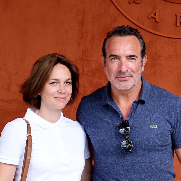 Jean Dujardin et sa femme Nathalie Péchalat au village lors des Internationaux de France de tennis de Roland Garros 2023, à Paris, France, le 11 juin 2023.

© Jacovides-Moreau/Bestimage