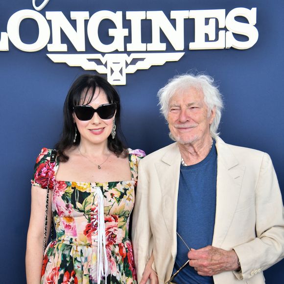 Exclusif - Hugues Aufray et sa femme Murielle dans l’espace VIP “le Pavillon Eiffel,” lors de la 12ème édition Longines Paris Eiffel Jumping au pied de la Tour Eiffel sur le Champ-de-Mars à Paris, France le 20 juin 2026

© Perusseau / Veeren / Bestimage