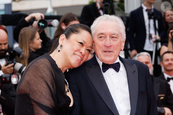 Tiffany Chen et son compagnon Robert de Niro - Montée des marches du film « Partir un jour » pour la cérémonie d’ouverture du 78ème Festival International du Film de Cannes, au Palais des Festivals à Cannes. Le 13 mai 2025
© Jacovides-Moreau / Bestimage
