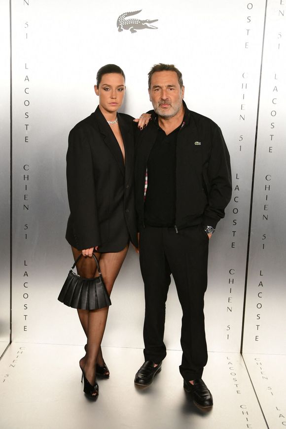 Adèle Exarchopoulos et Gilles Lellouche au photocall de la soirée Lacoste X Chien 51 au club Silencio en marge du 78ème Festival International du Film de Cannes, France, le 18 mai 2025. © Romain Doucelin/Bestimage