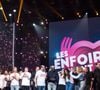 Ce dernier y a participé aux Enfoirés à trois reprises : en 1989, 1994 et 1995.

Mimie Mathy, Jenifer Bartoli, Liane Foly, Claudio Capéo, Zazie, Philippe Lacheau, Gérard Jugnot, Patrick Bruel, Arthur (Jacques Essebag), Kad Merad, Omar Sy, Laure Pester (Lorie), Amel Bent, Franck Dubosc, Vitaa, Élie Semoun, Issa Doumbia, Nikos Aliagas, Camille Lellouche - Enregistrement de l'émission "Les enfoirés jouent le jeu" sur TF1. © Cyril Moreau / Bestimage
