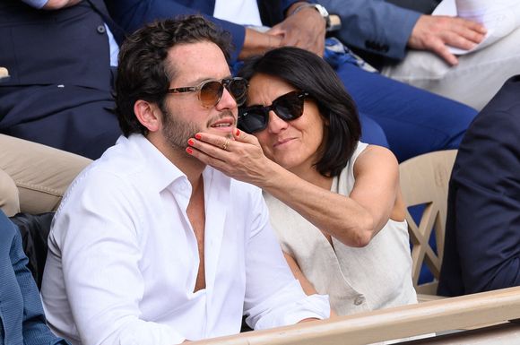 Florence Foresti et Alexandre Kominek dans les tribunes lors des Internationaux de France de tennis à Roland Garros le 29 mai 2022 à Paris, France. Photo by Laurent Zabulon/ABACAPRESS.COM