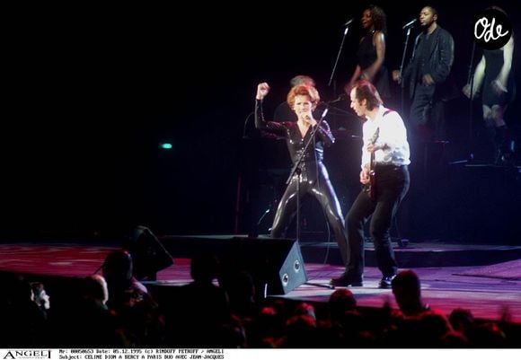 Archives - Céline Dion et Jean-Jacques Goldman lors du concert de Céline Dion au Stade de France à Paris.
Crédit : AGENCE / BESTIMAGE