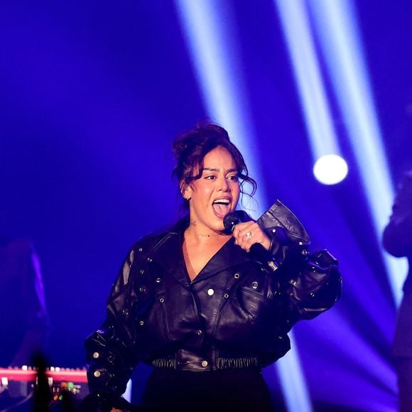 Amel Bent - Nouvelle édition du Foot-Concert organisé par le Réseau A.Ma.N.D./Huntington Avenir à la LDLC Arena à Lyon, le 11 Novembre 2024. © Dominique Jacovides/Bestimage