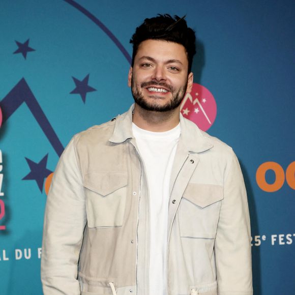 Kev Adams au photocall de la 5ème soirée de compétition de la 25ème édition du Festival international du film de comédie de l'Alpe d'Huez, France, le 21 janvier 20222. © Dominique Jacovides/Bestimage
