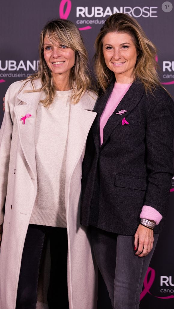 Sandrine Arcizet et Élodie Ageron ont présenté en larmes le dernier numéro des Animaux de la 8 en février 2025.

Sandrine Arcizet, Elodie Ageron lors de la soirée de lancement "Octobre Rose" organisée par l'association Ruban Rose à Paris le mardi 30 septembre 2025. 

© Léa Maï - Léo Trotin - association Ruban Rose / Bestimage