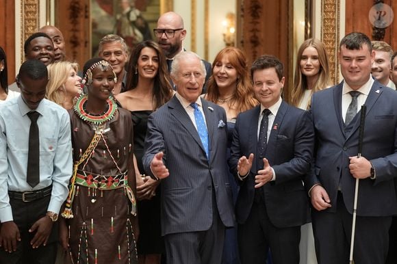 George Clooney et Amal Clooney lors de la réception en l'honneur des lauréats des King's Trust Awards au palais de Buckingham le 25 juin 2025  Stefan Rousseau/WPA-Pool/Bestimage