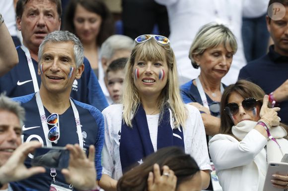 Le duo, très complice, se dira oui en 2010 en Egypte et donnera naissance a trois enfants...

Nagui et sa femme Melanie Page lors du match 1/4 de finale de la Coupe du Monde de la FIFA 2018 en Russie, France vs Uruguay Dans le stade de Nijni-Novgorod, Nijni-Novgorod, Russie le 6 juillet 2018. Photo Henri Szwarc/Abaca