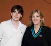 Amanda Sthers et son fils Oscar Bruel au village lors des Internationaux de France de tennis de Roland Garros 2024 à Paris, le 31 mai 2024. 

Photo : Jacovides-Moreau / Bestimage